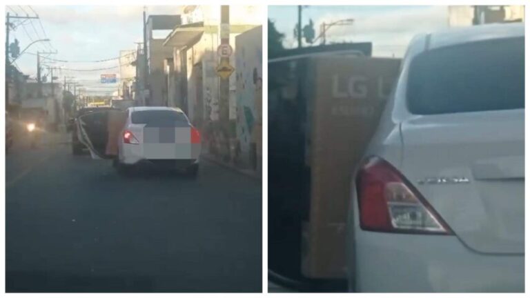 SÓ SE VÊ NA BAHIA! Motorista transporta TV gigante na CBX com a porta aberta